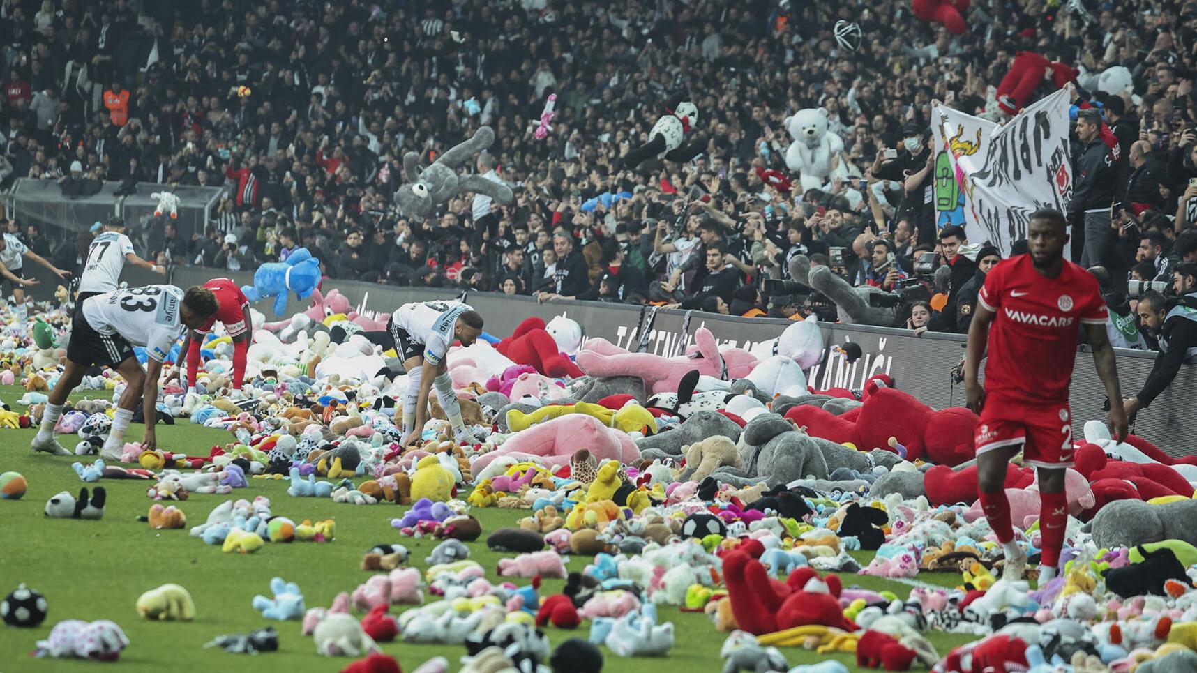Turkish soccer fans throw stuffed animals on the field, vent dissatisfaction with government quake response
